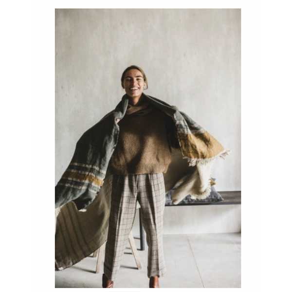 image of woman modeling a belgian towel